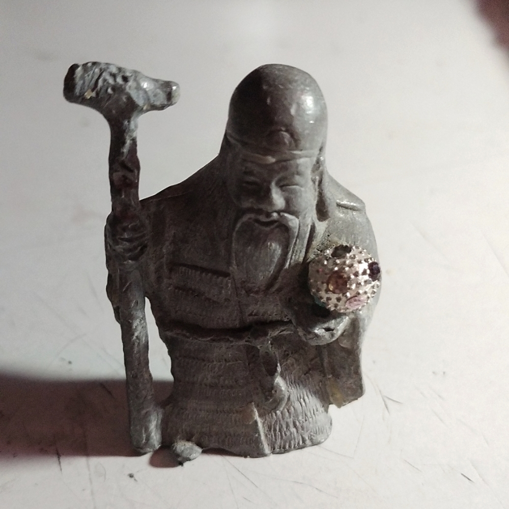 Pewter figurine man with walking stick